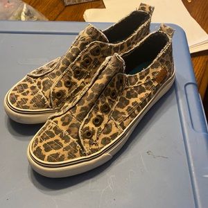 Gently worn blow fish slip ons